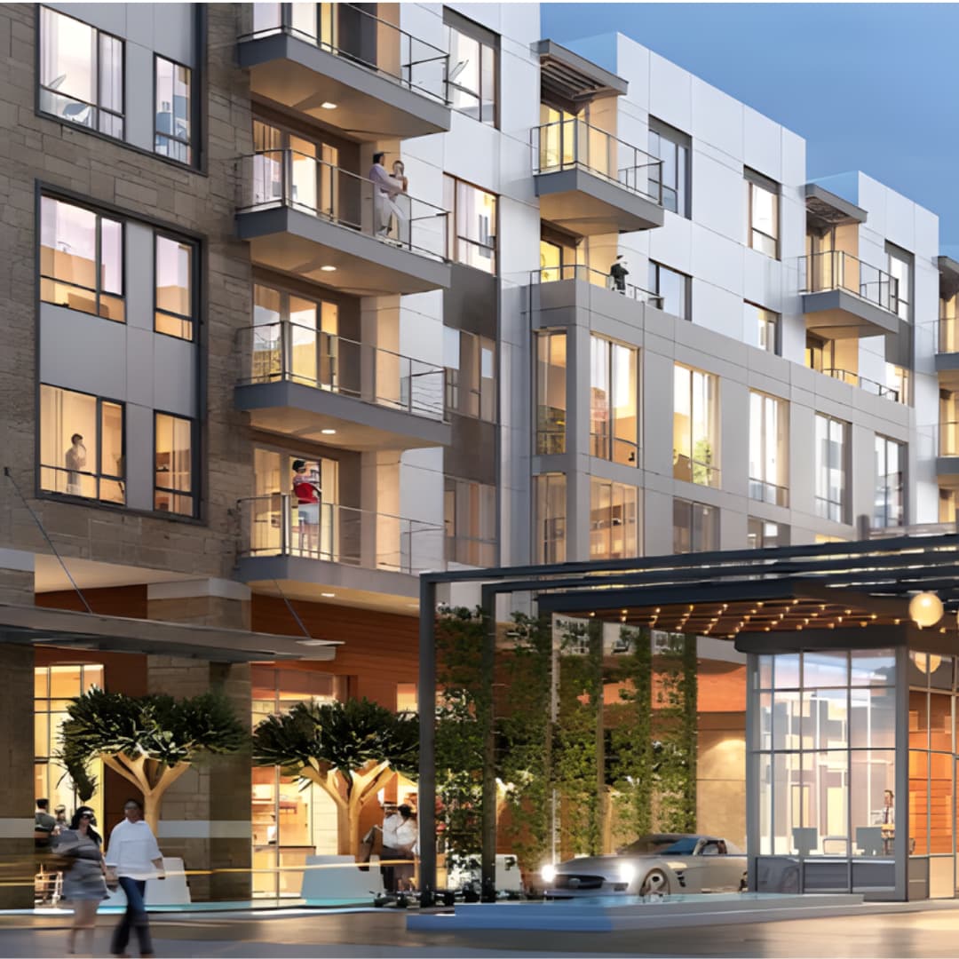 Multi-story residential building with balconies and outdoor seating